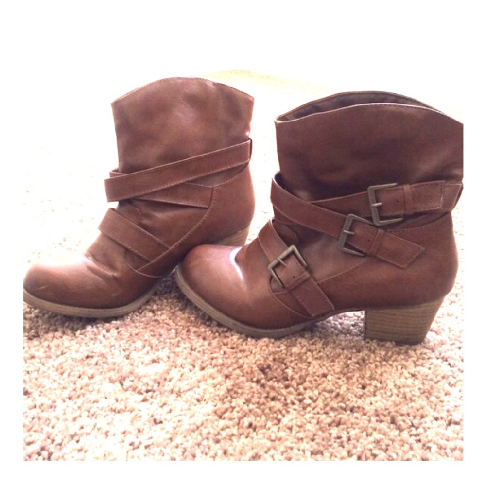 Gently worn tan boots